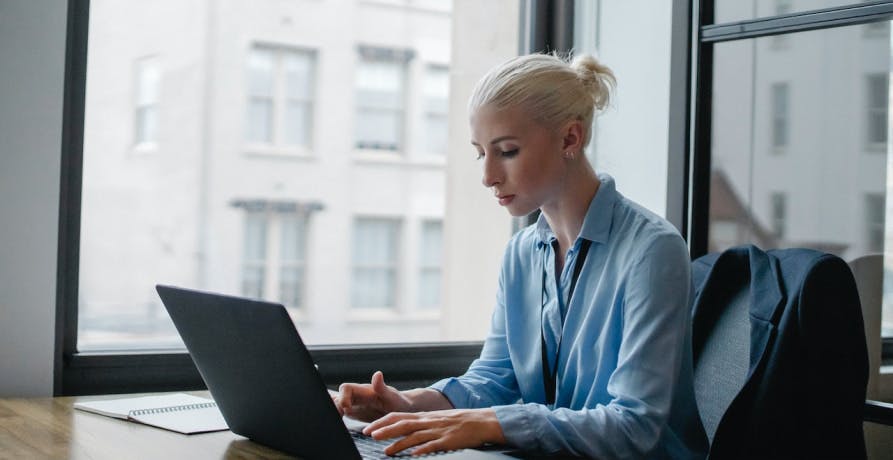 a woman who is working on laptop