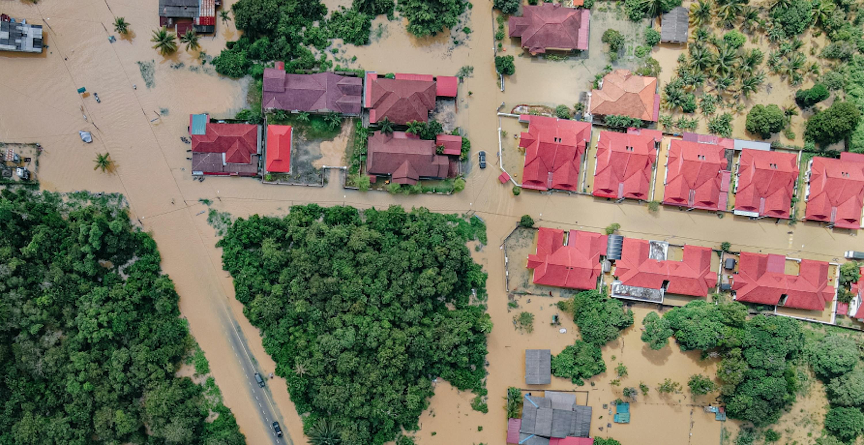 arial shot of flooded town and buildings