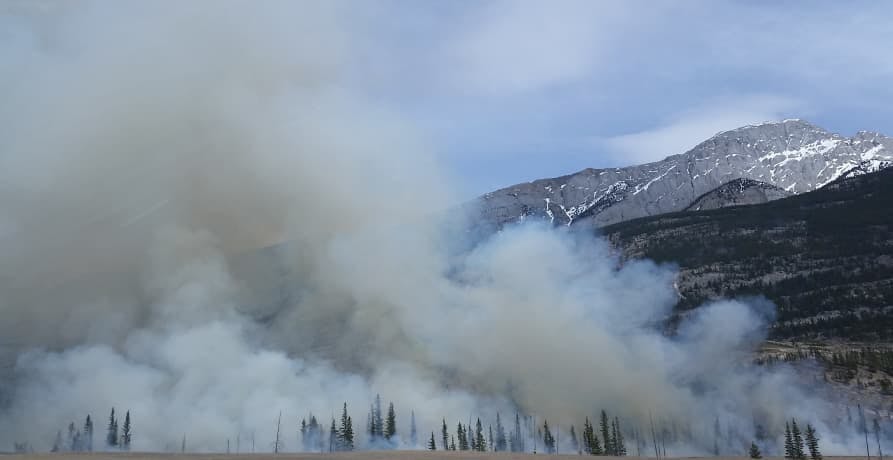 smoke coming out of mountains