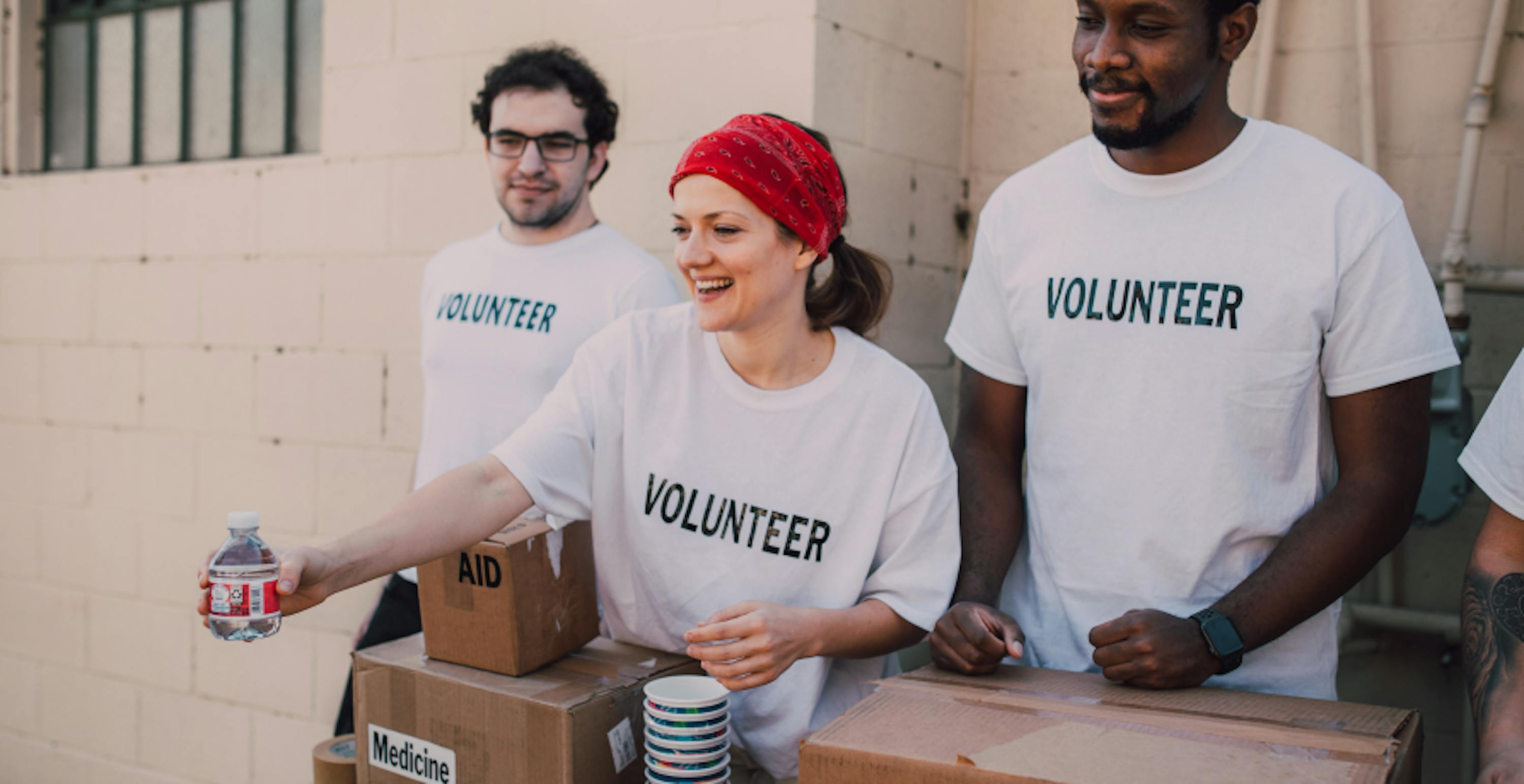 volunteers handing out drinks