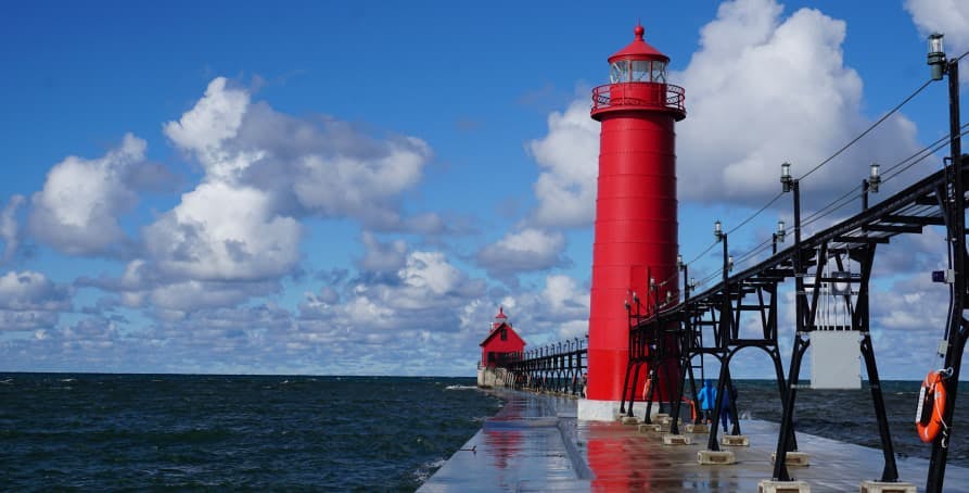 red lighthouse on harbour in Michigan