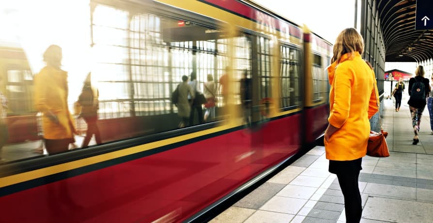 person standing in line to commute