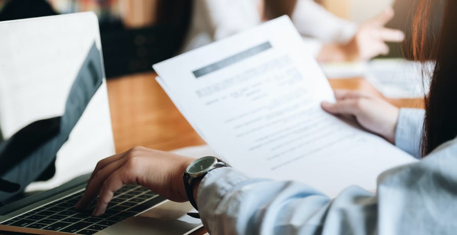 woman looking at a document