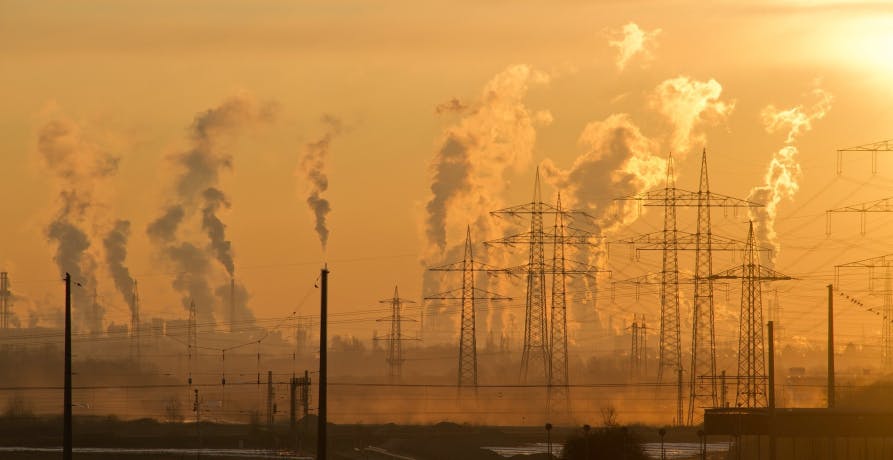 pollution being released by factories into the air