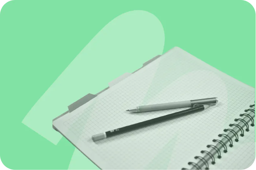 Cahier et stylos