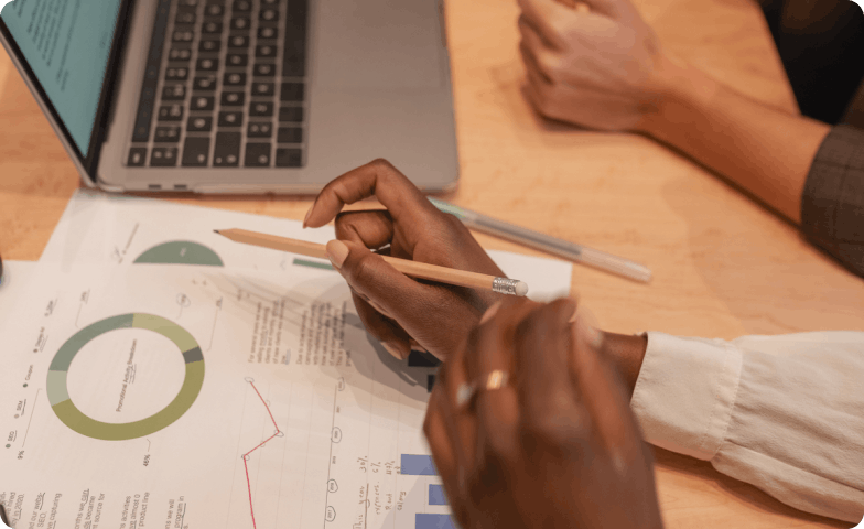 people showing sustainability performance charts