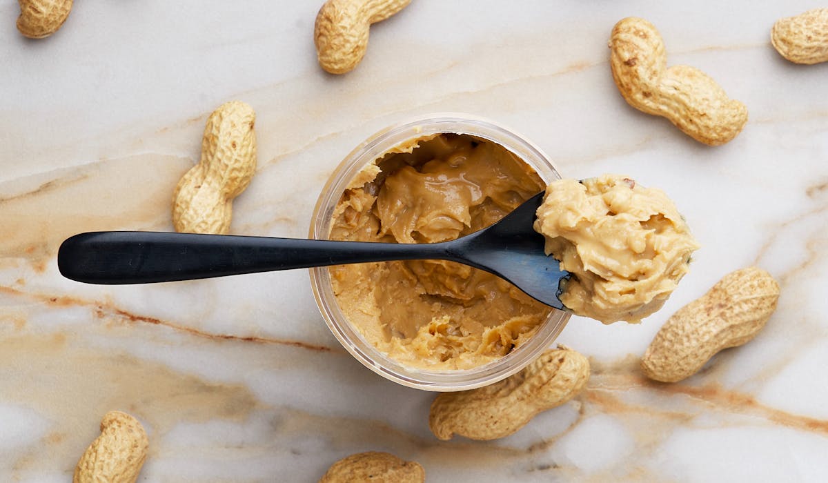 Peanut butter jar with spoon