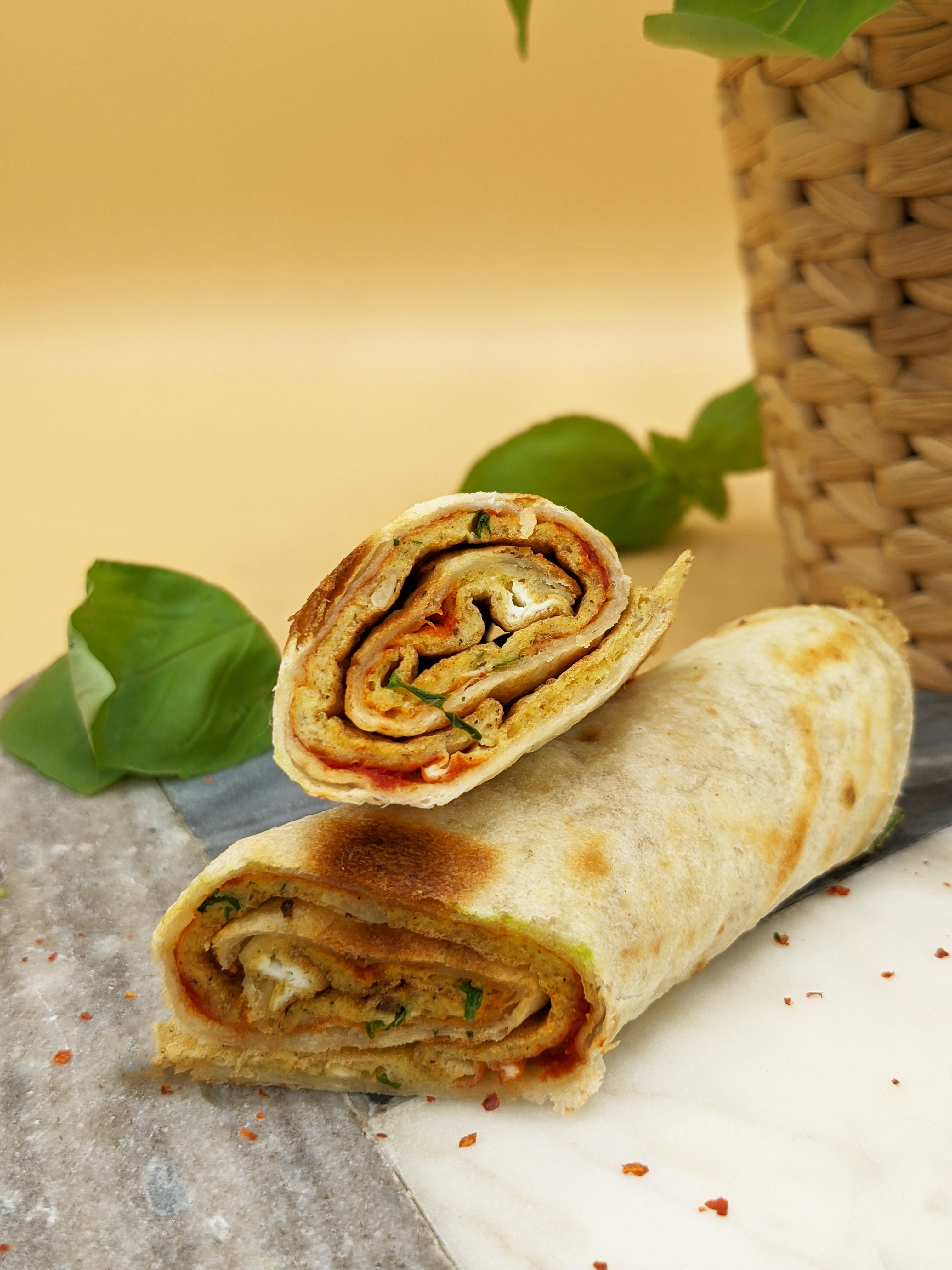 Two cricket egg rolls stacked on each other