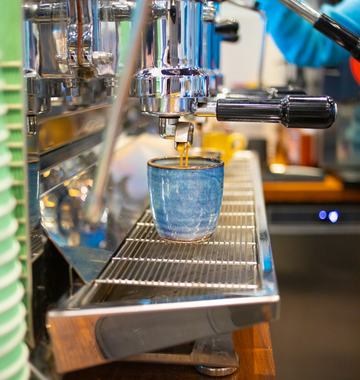 Espresso machine pouring coffee