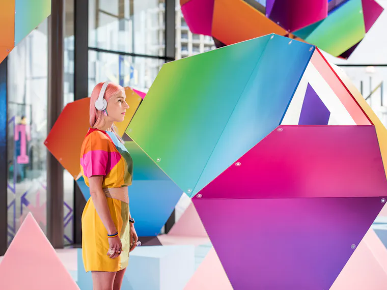 Woman standing in art gallery