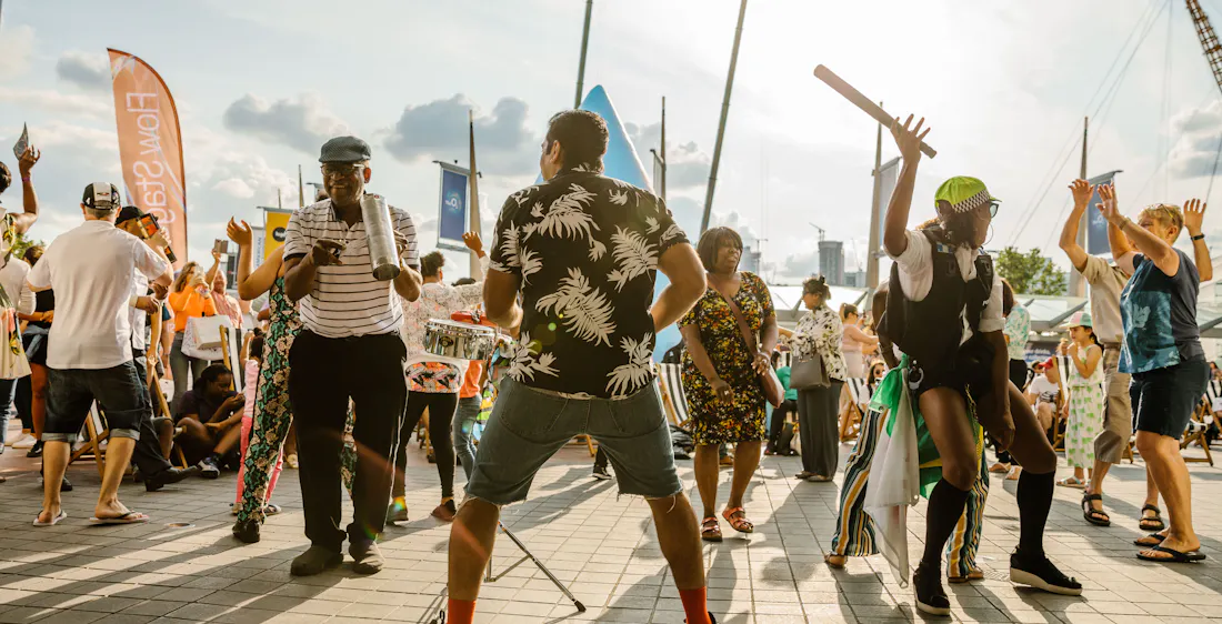 People dancing in the sun in Greenwich