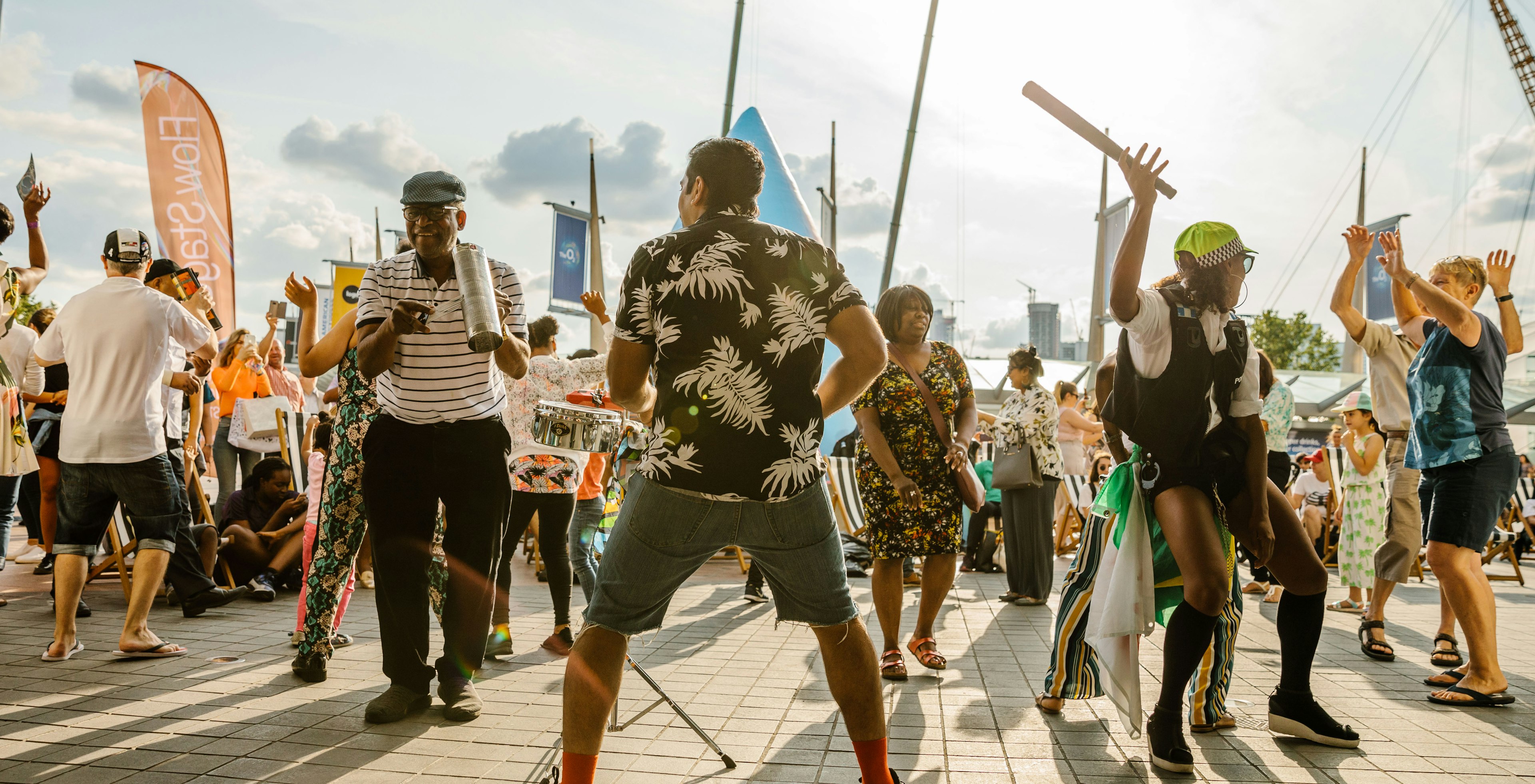 People dancing in the sun in Greenwich