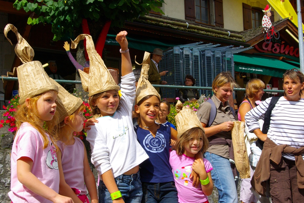 A group of children wearing hats 