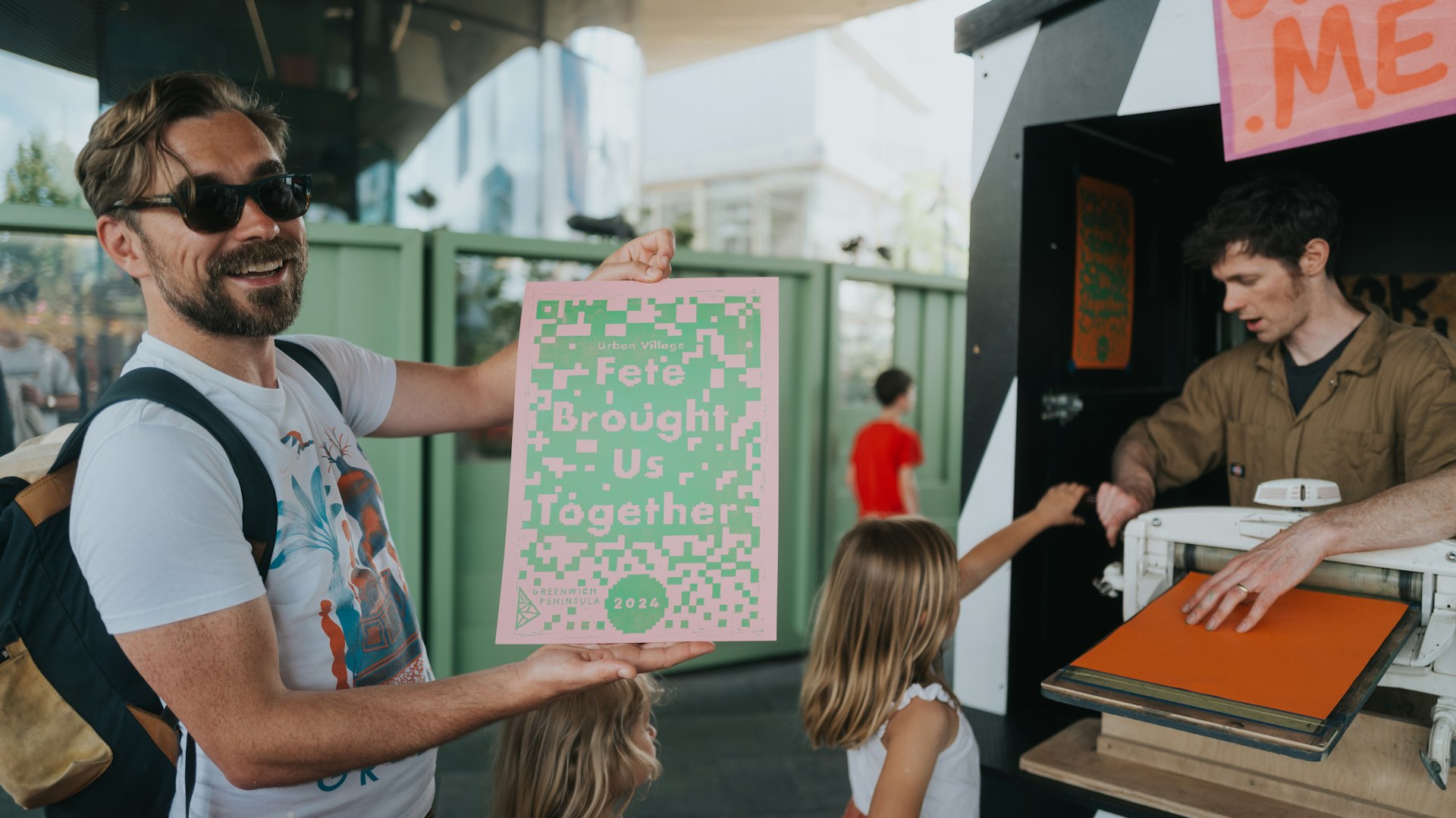 A man holding a print
