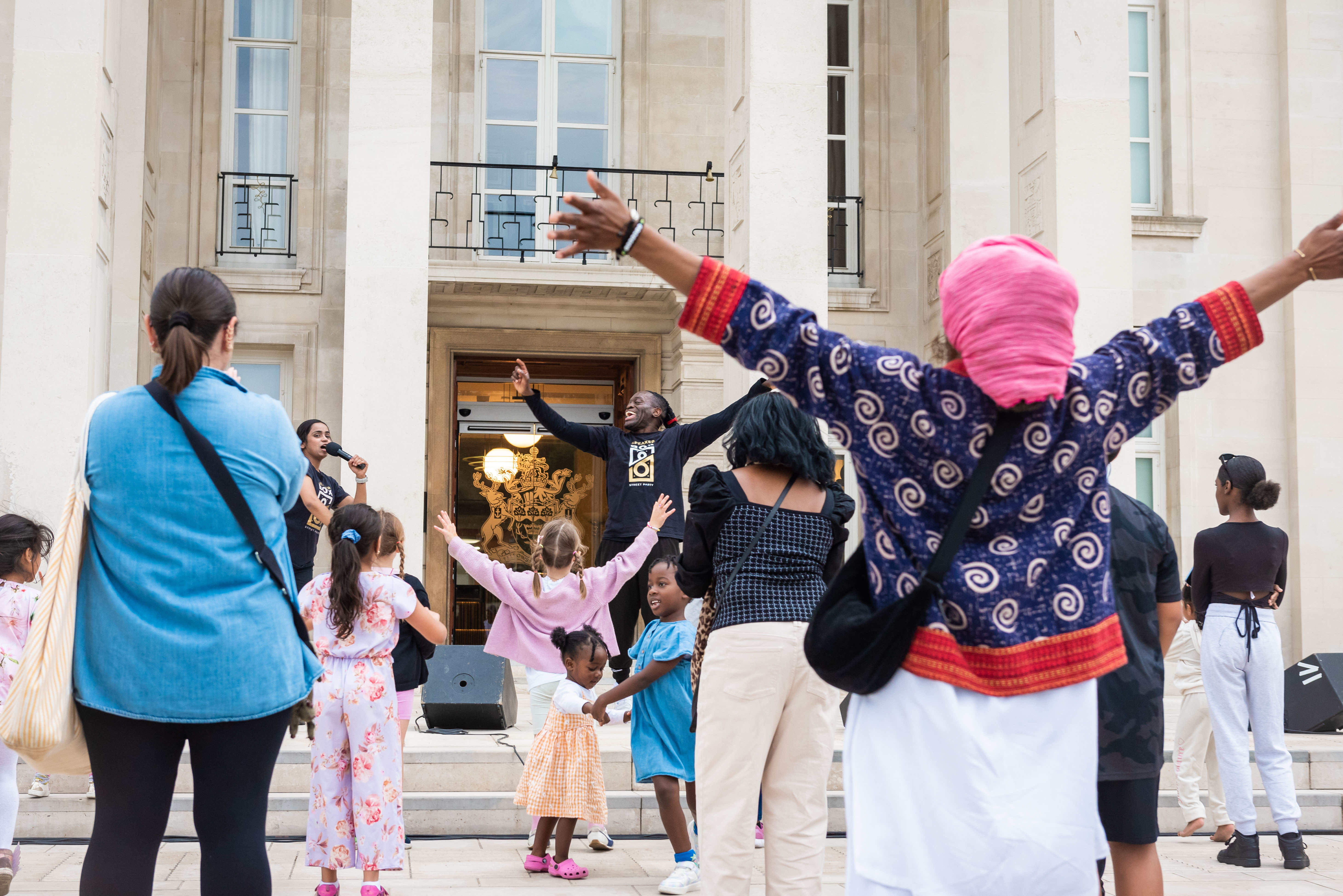 An audience dances