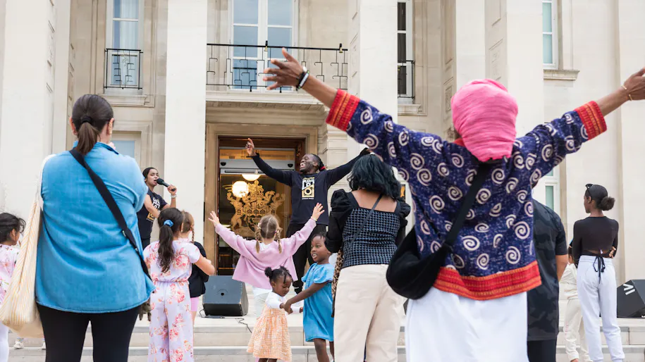 An audience dances