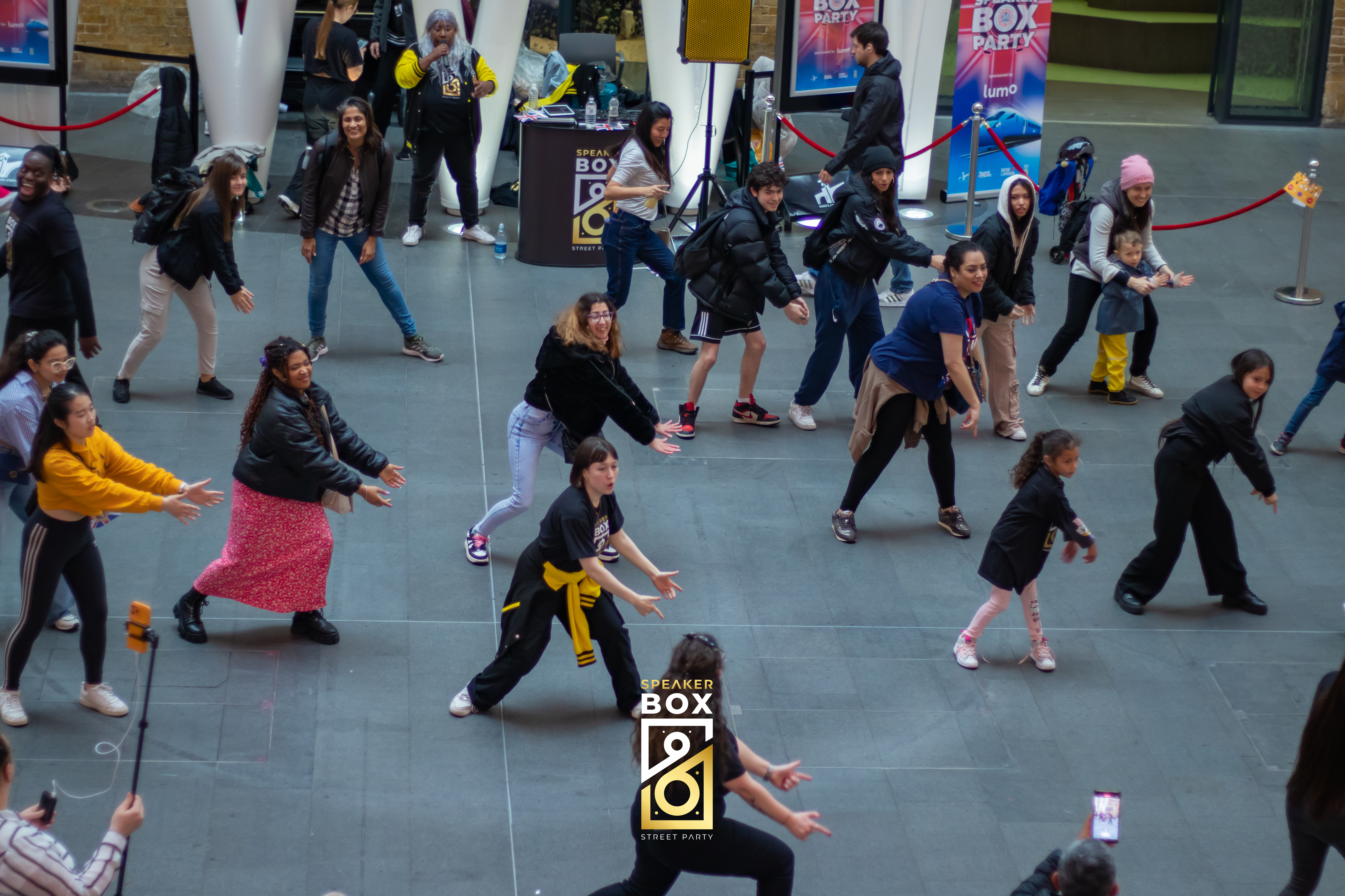 A group of people dance 