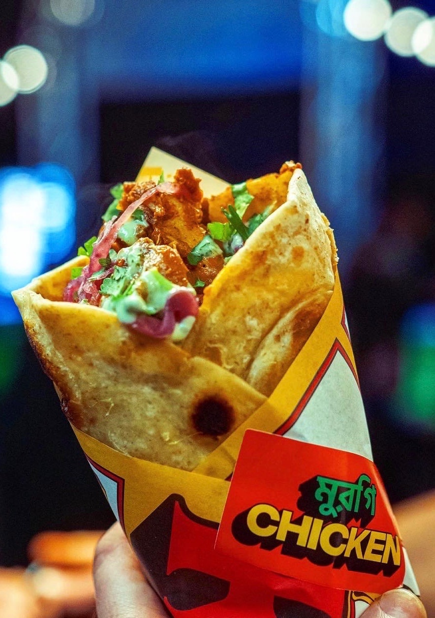 A person holding an Indian wrap
