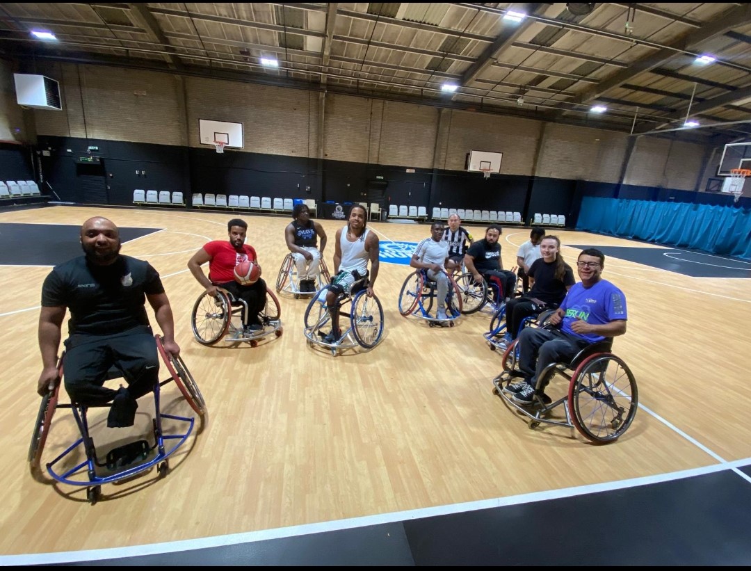 A wide shot of basketball players
