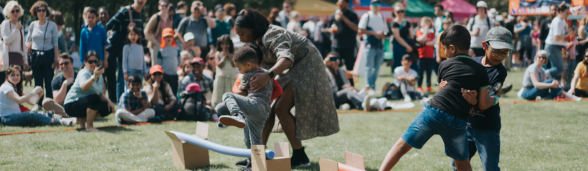 Children run an obstacle course