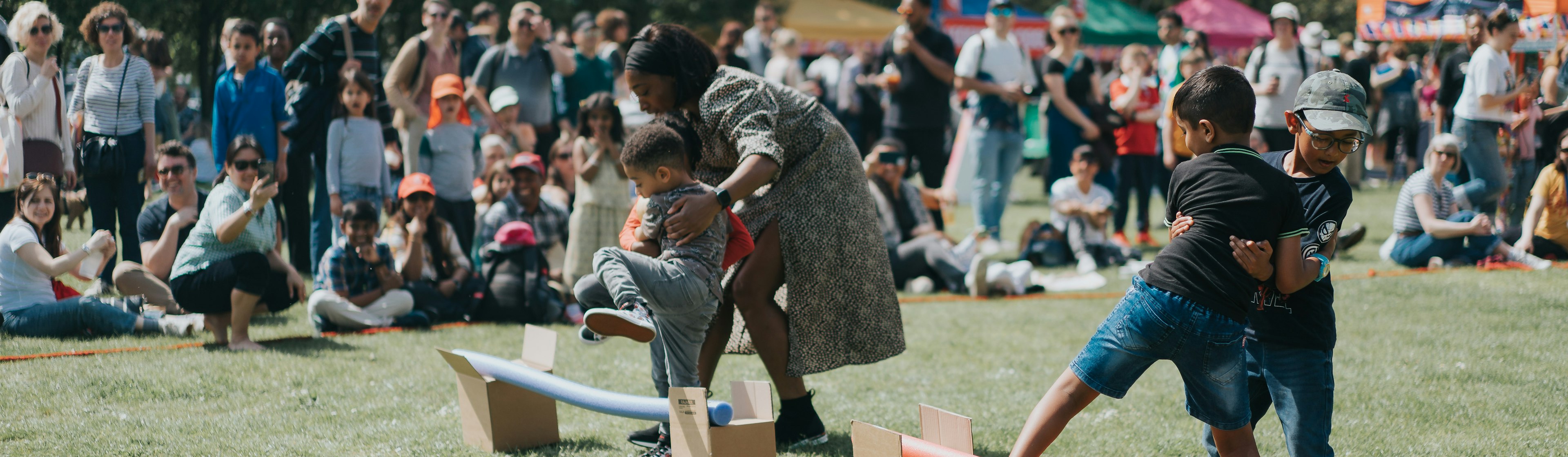 Children run an obstacle course