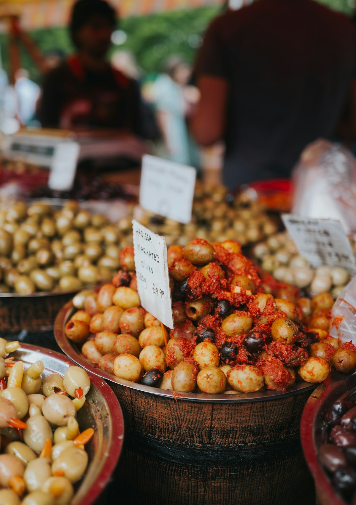 Barrels of olives at the market stall