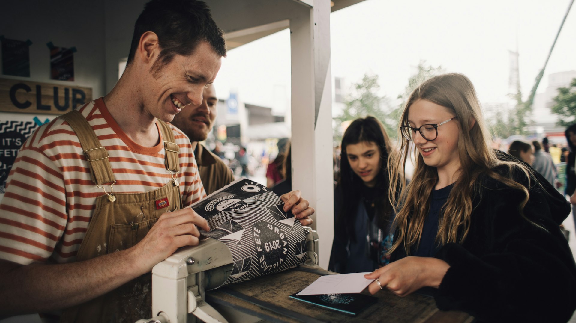 A man and woman make prints
