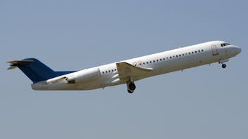 Fokker 100 taking off