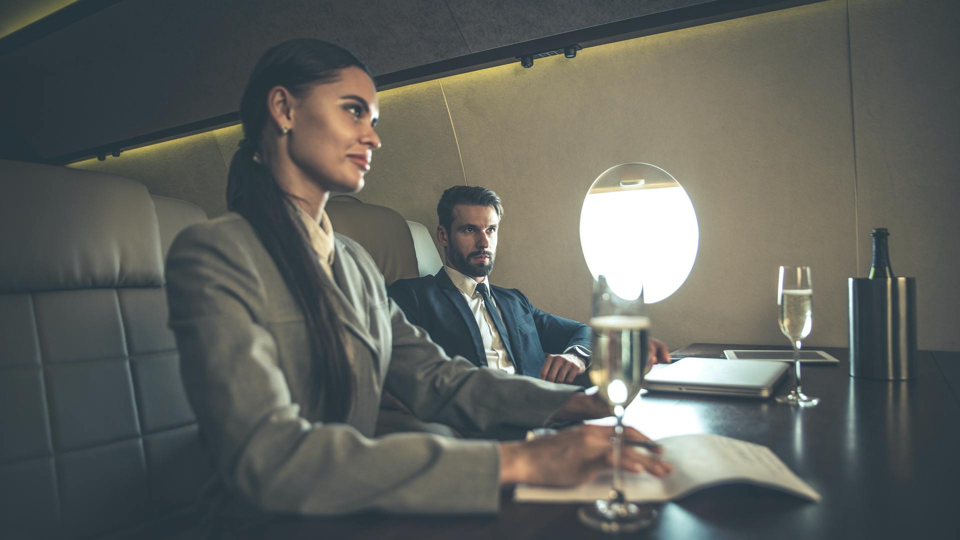 Conduct all matters concerning the government in a flying conference room aboard a private charter plane.