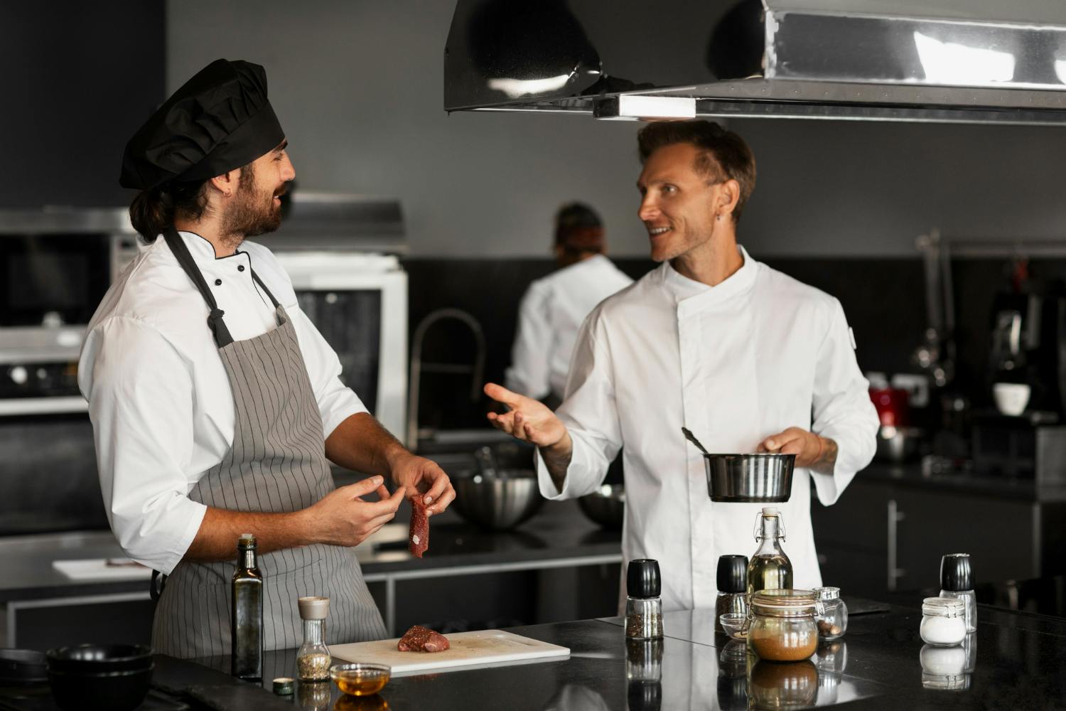 Two people talking in kitchen