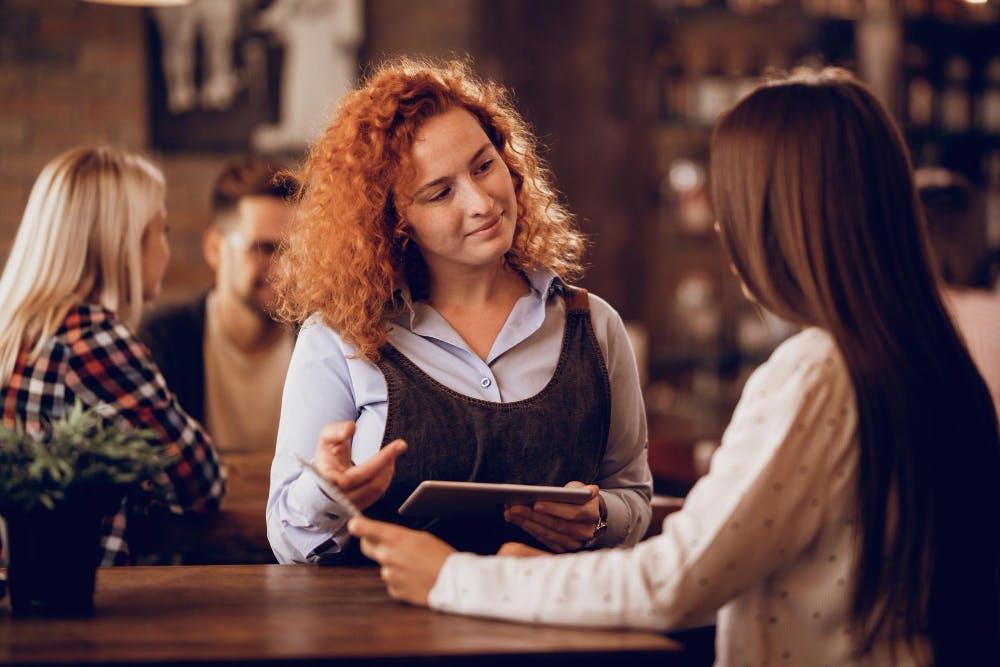 Staff serving the customer