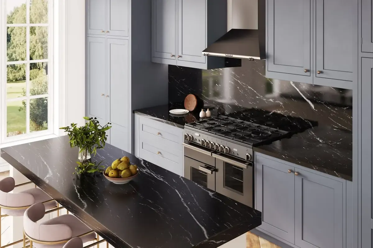 black granite kitchen surface with grey cabinets