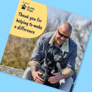 Image of a social media image featuring a guide dog owner and a black Labrador.