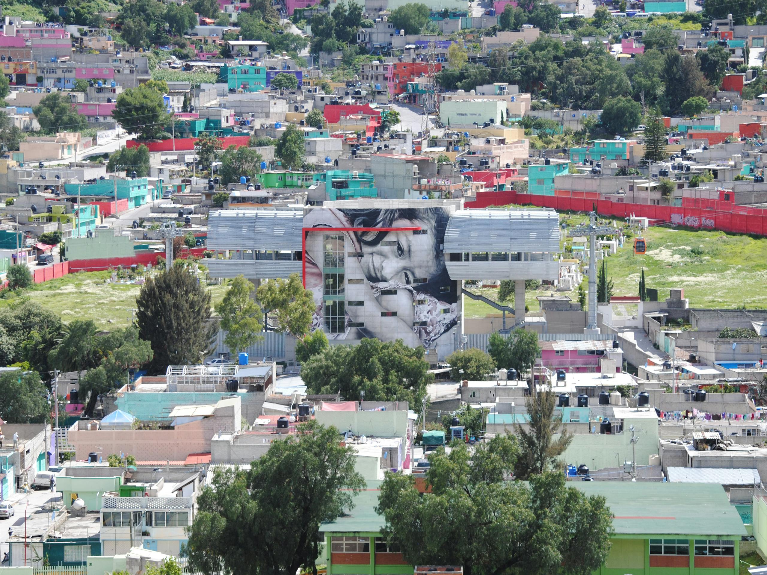 Guido's second piece entitled 'Valeria' at Mexicable Station 6, Ecatepec, Estado de México, Mexico. July 2016 Photograph: Guido van Helten