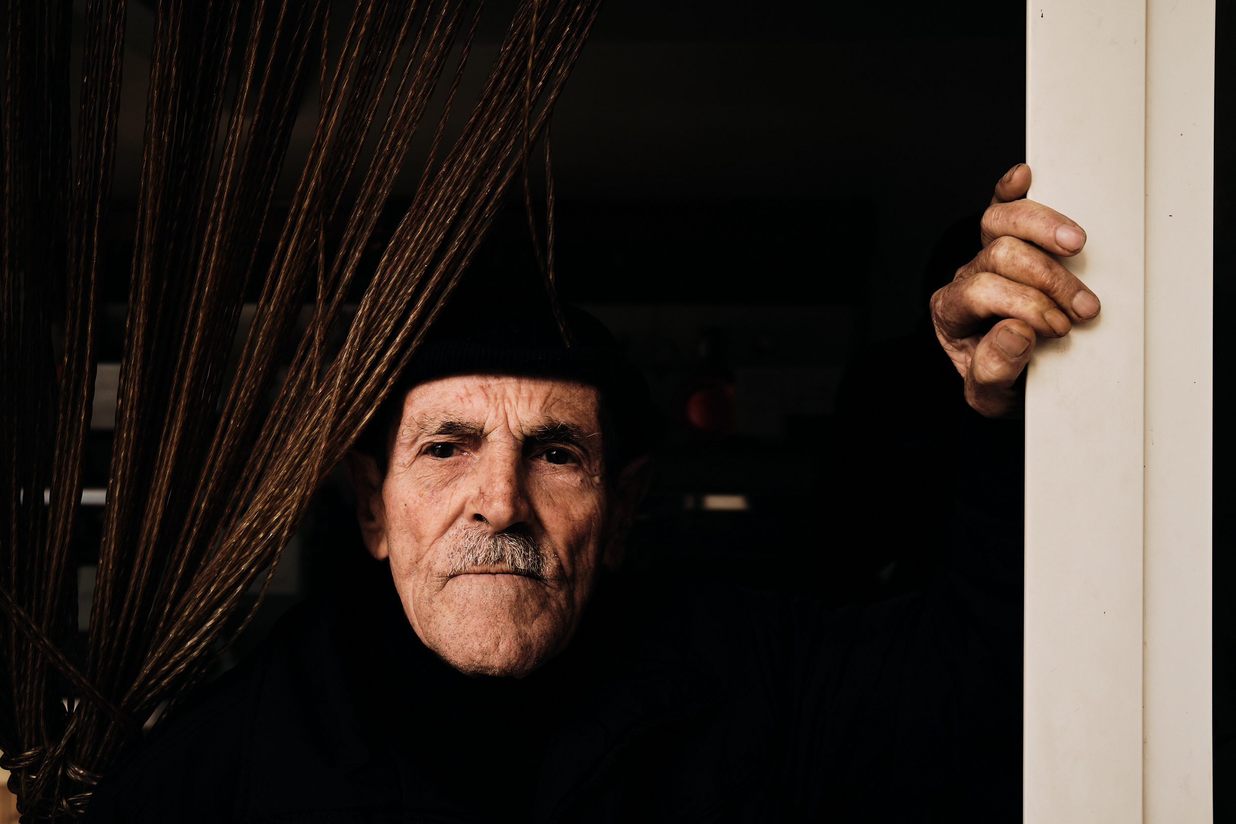 Residents at Panificio Rizzo at the Istituto Case Popolari, Milo Nuovo district, Sicily. December 2021