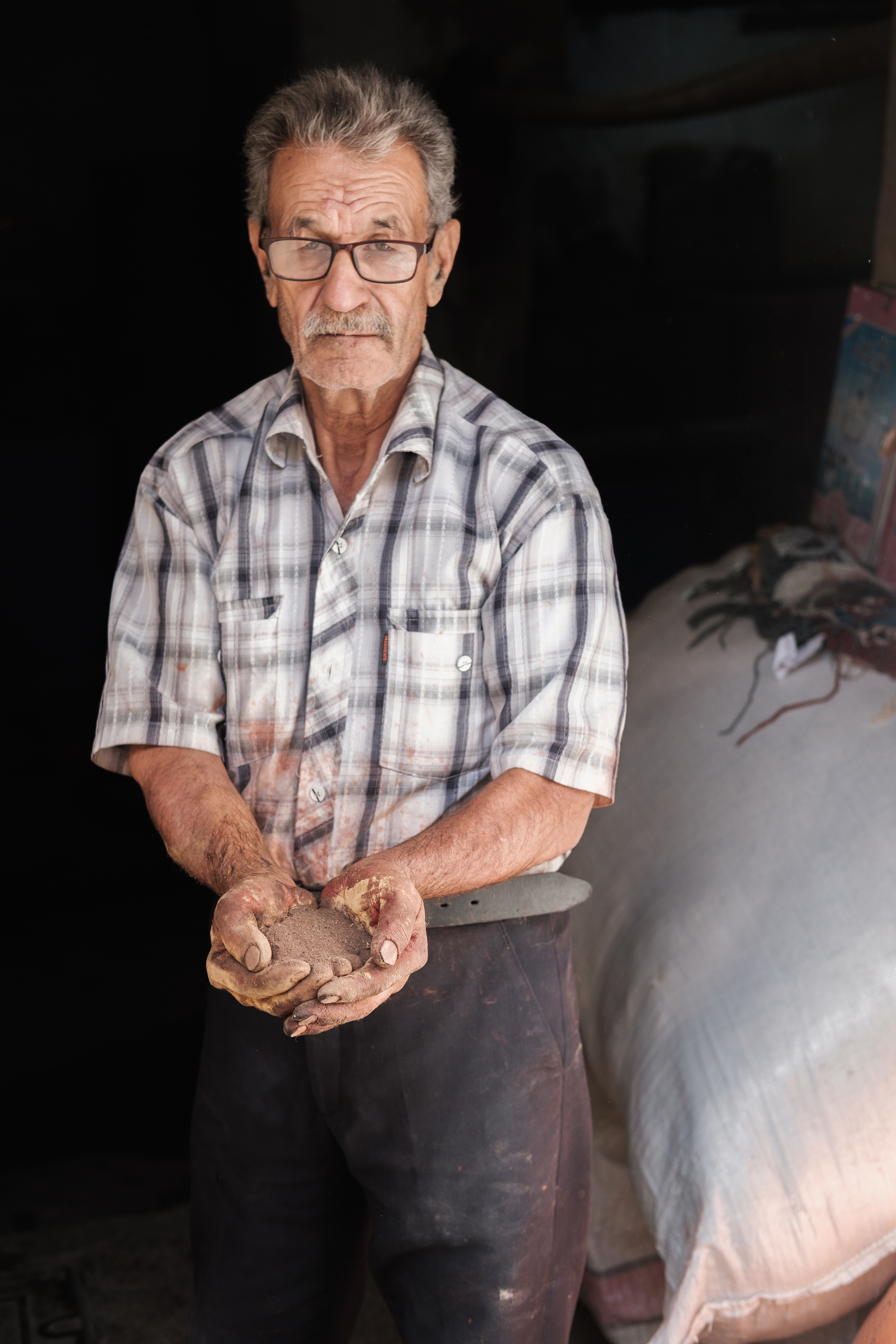 Wool dying worker Kashan, Iran. November 2018 Photograph: Guido van Helten