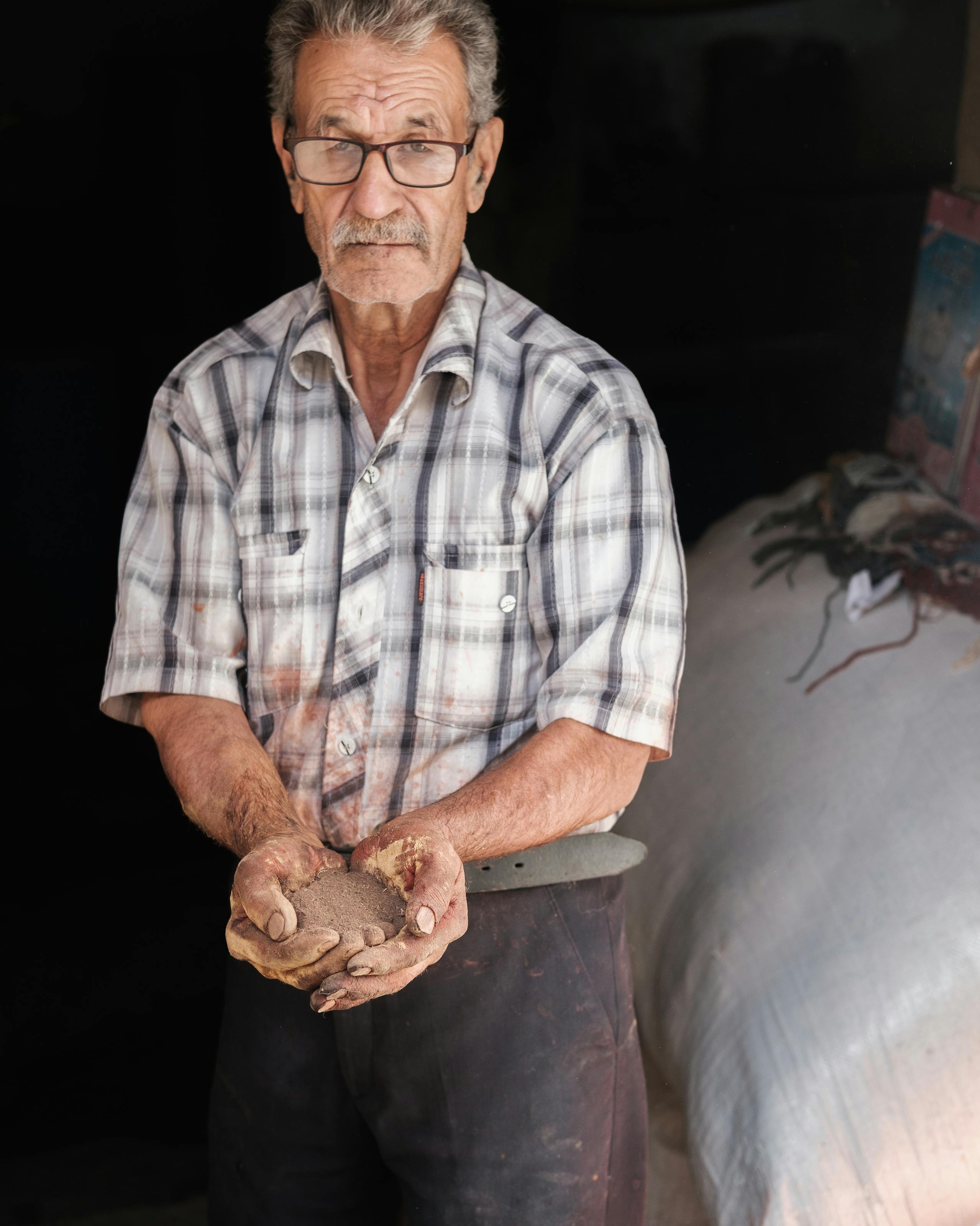 Wool dying worker Kashan, Iran. November 2018 Photograph: Guido van Helten