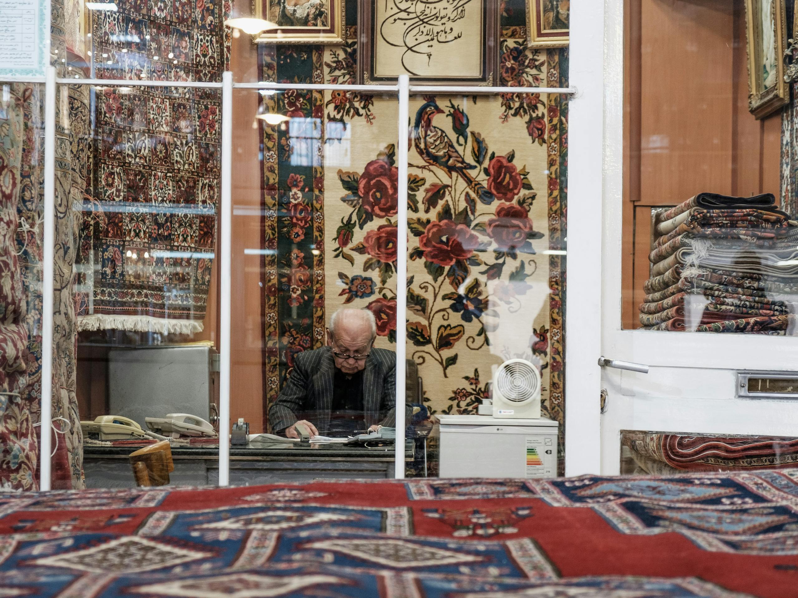 Carpet Vendors at Tehran's Central Bazaar Tehran, Iran. November 2018 Photograph: Guido van Helten
