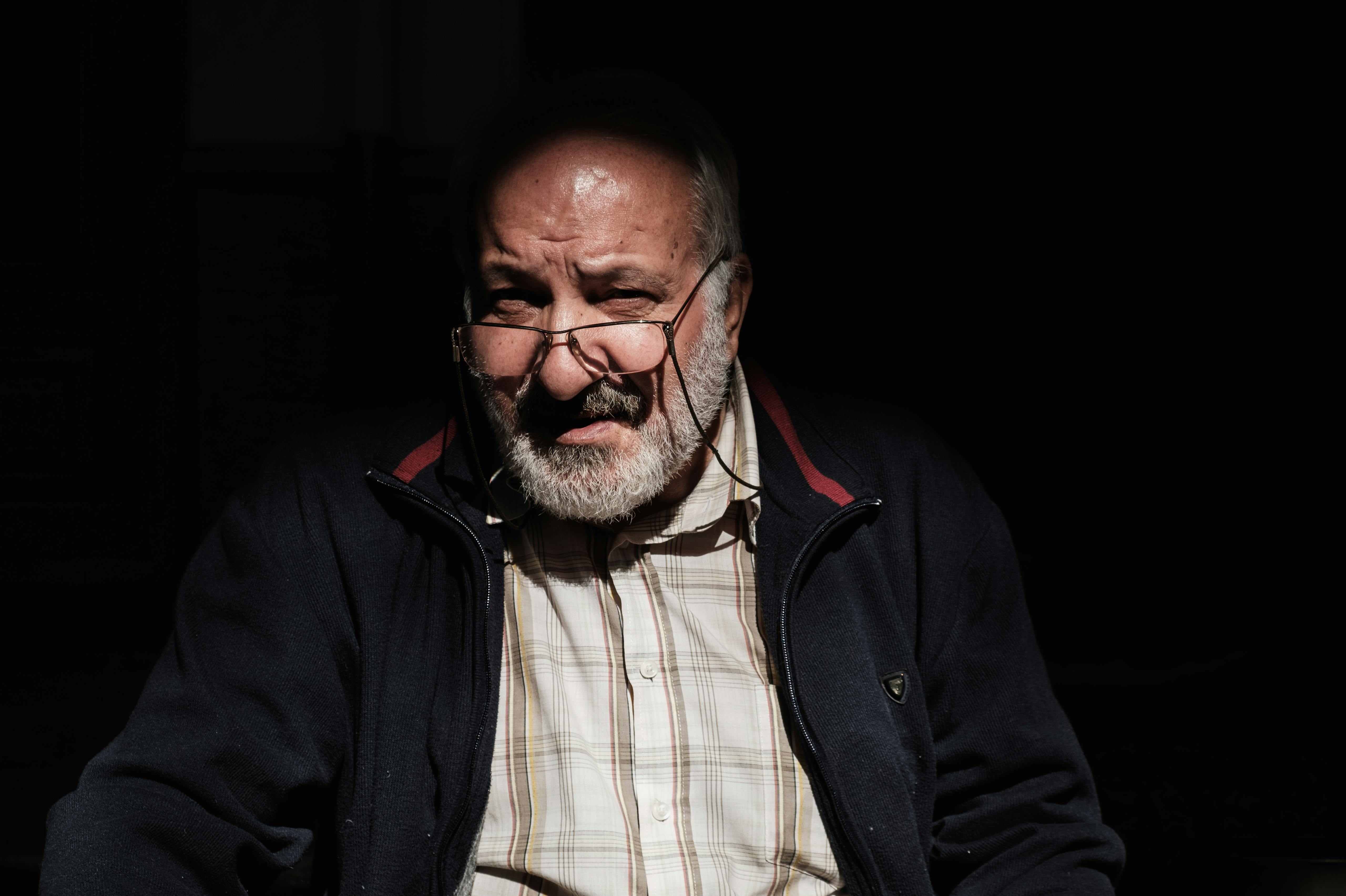 A Carpet worker in Tehran's Central Bazaar Tehran, Iran. November 2018 Photograph: Guido van Helten