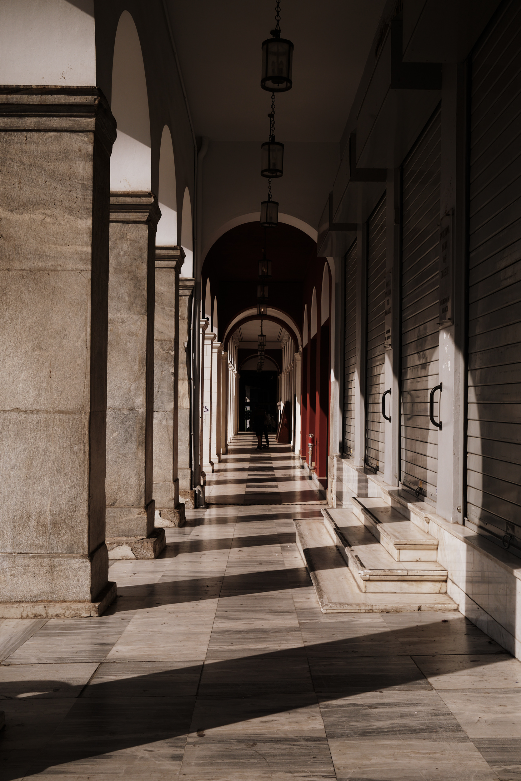 Covered walkways off Georgiou I Square, Patras, Greece. November 2021