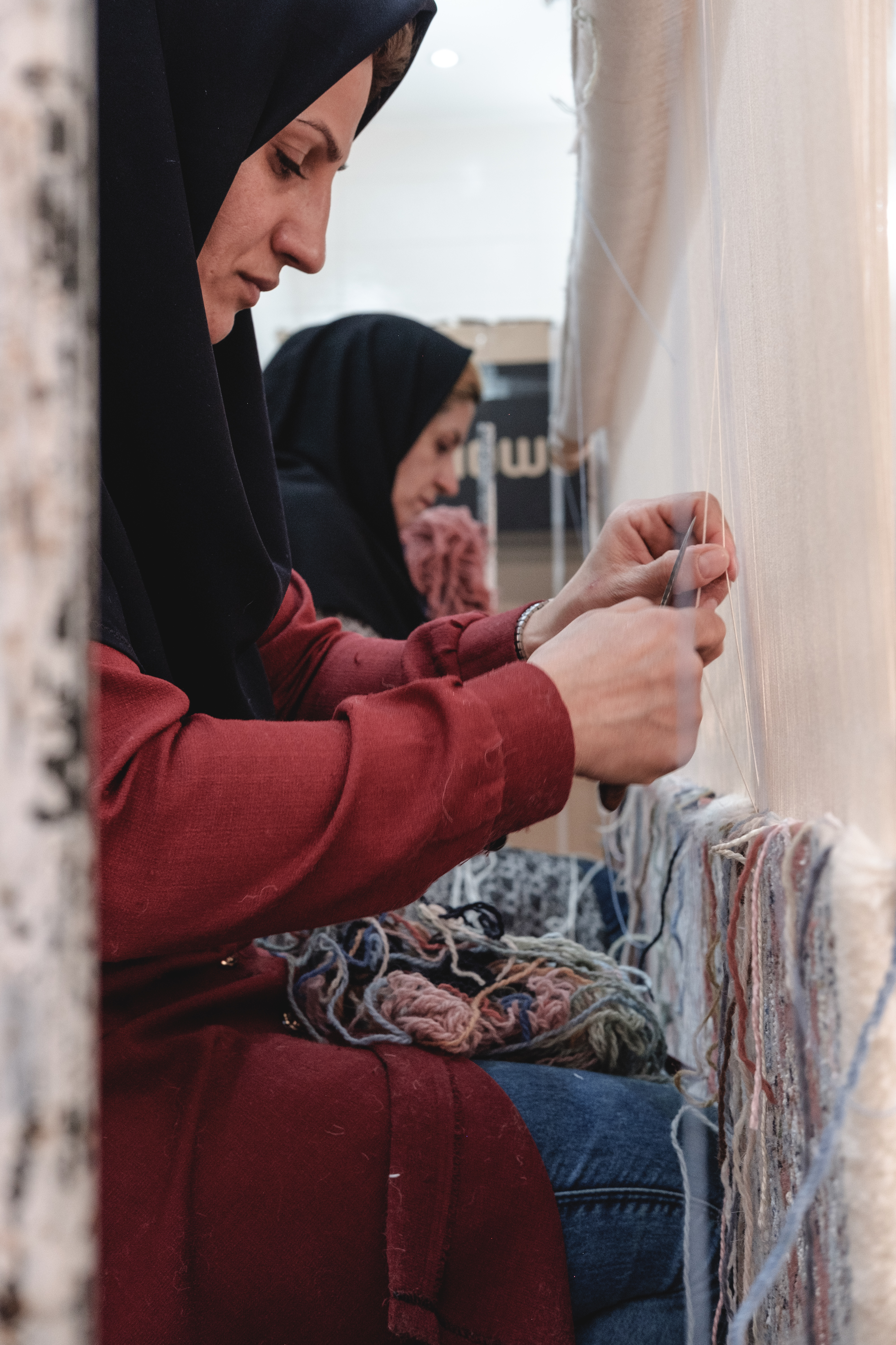 Traditional family carpet weaving often made in the home and can take up to a year Kashan, Iran. November 2018 Photograph: Guido van Helten