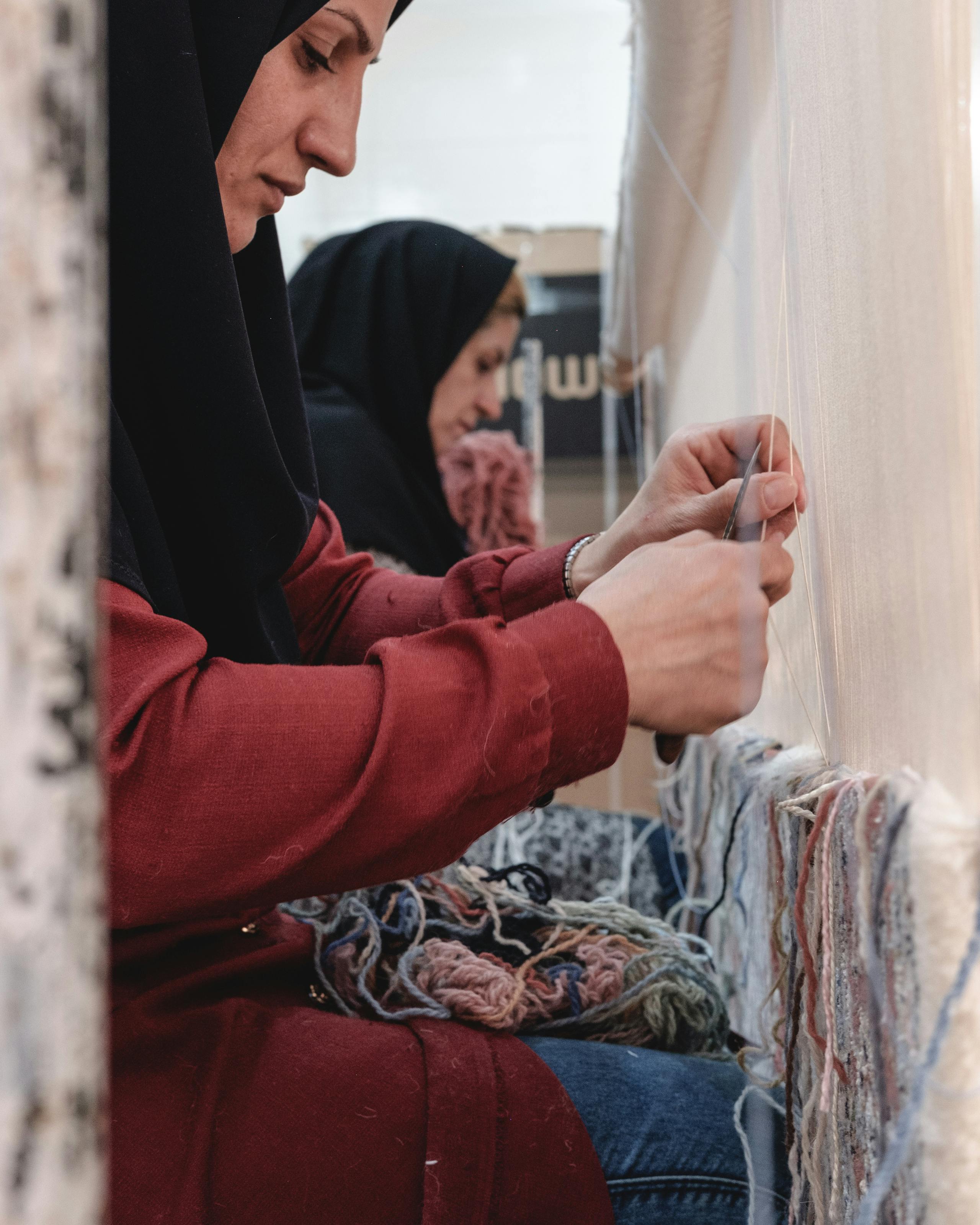 Traditional family carpet weaving often made in the home and can take up to a year Kashan, Iran. November 2018 Photograph: Guido van Helten