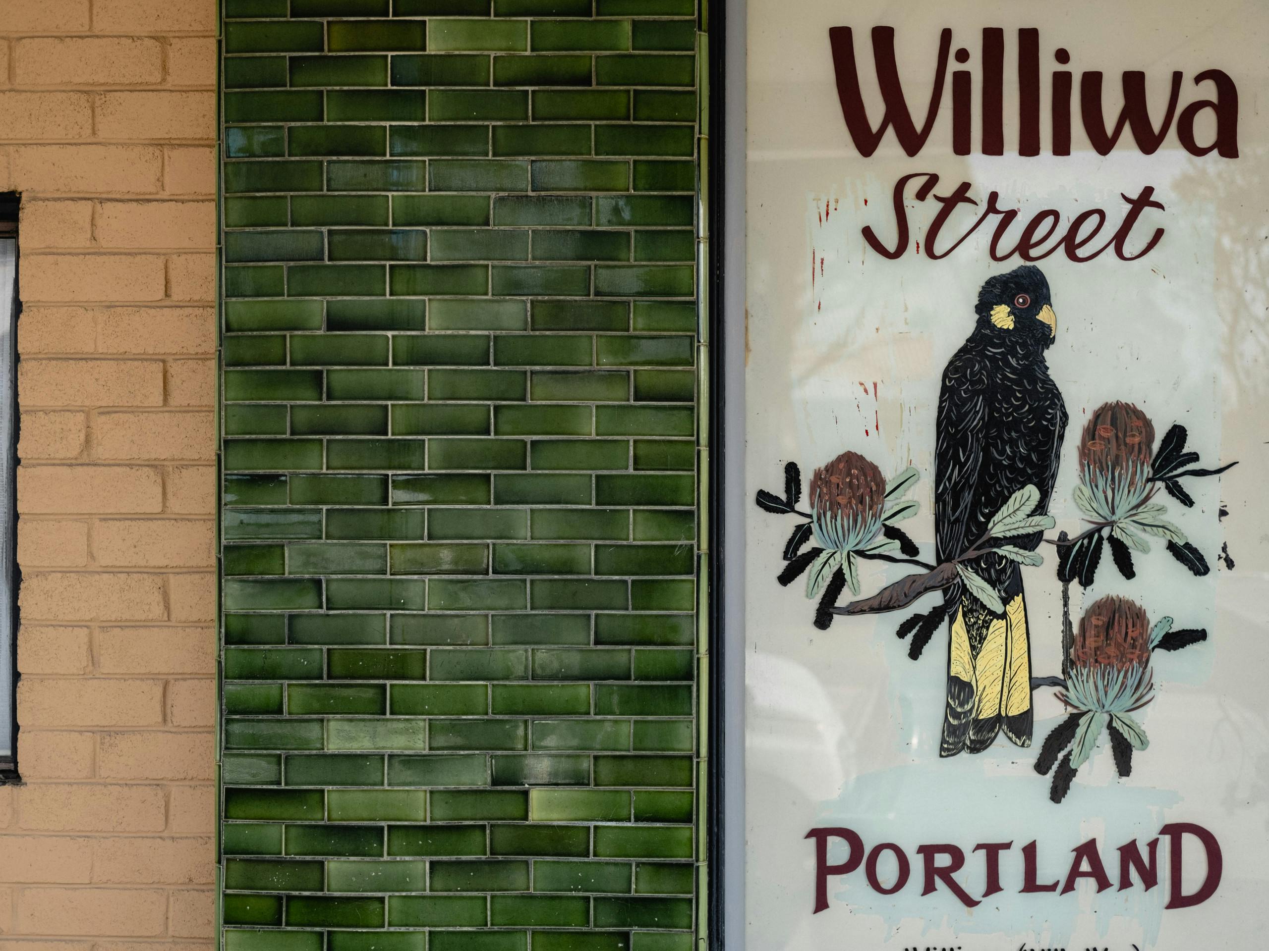 Hand-painted sign on a main thoroughfare of town Portland, NSW, Australia. May 2018 Photographs: Guido van Helten