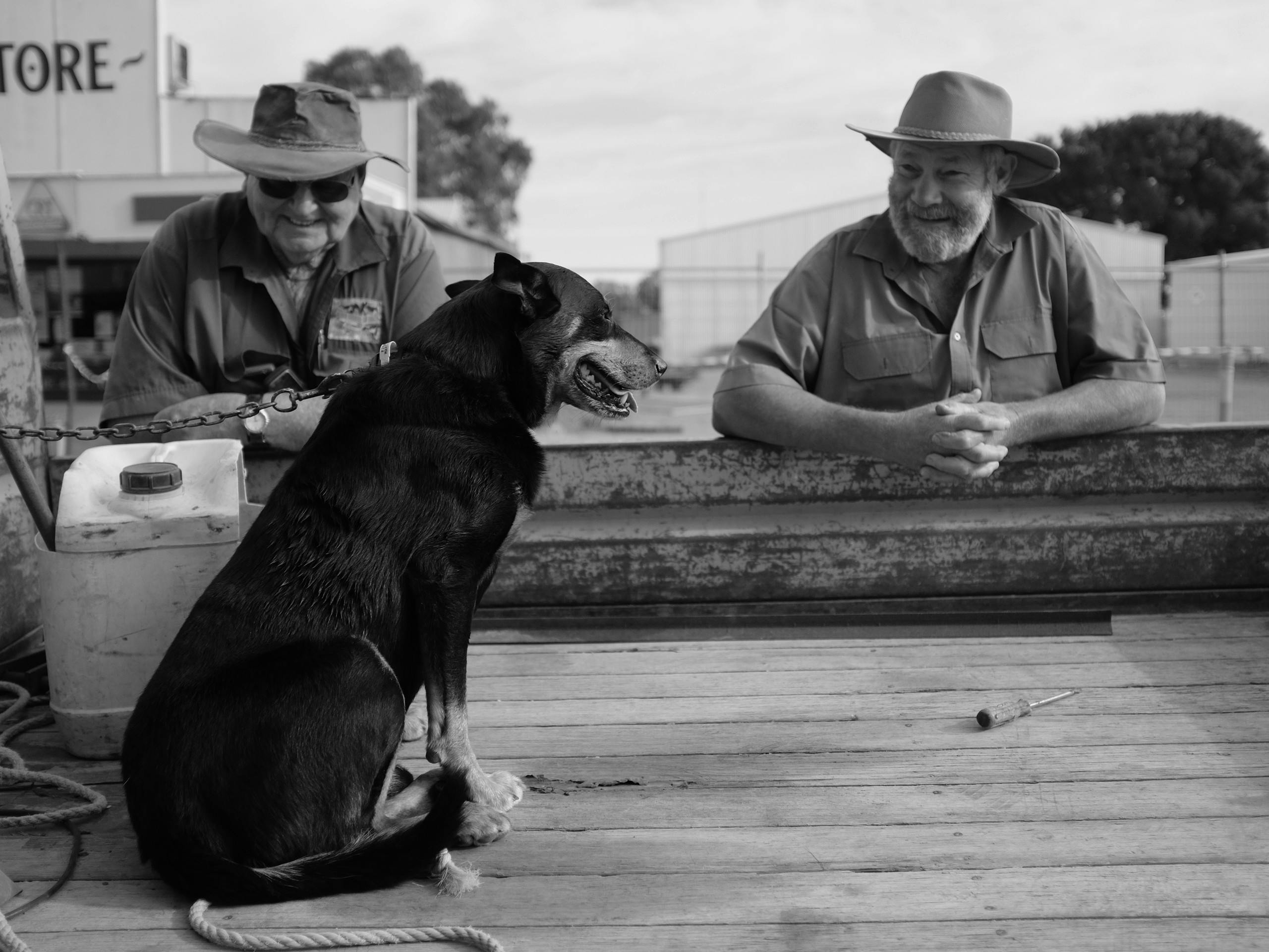 Locals hang out in main street, Brim, Victoria, Australia. December 2015. Photograph: Guido van Helten