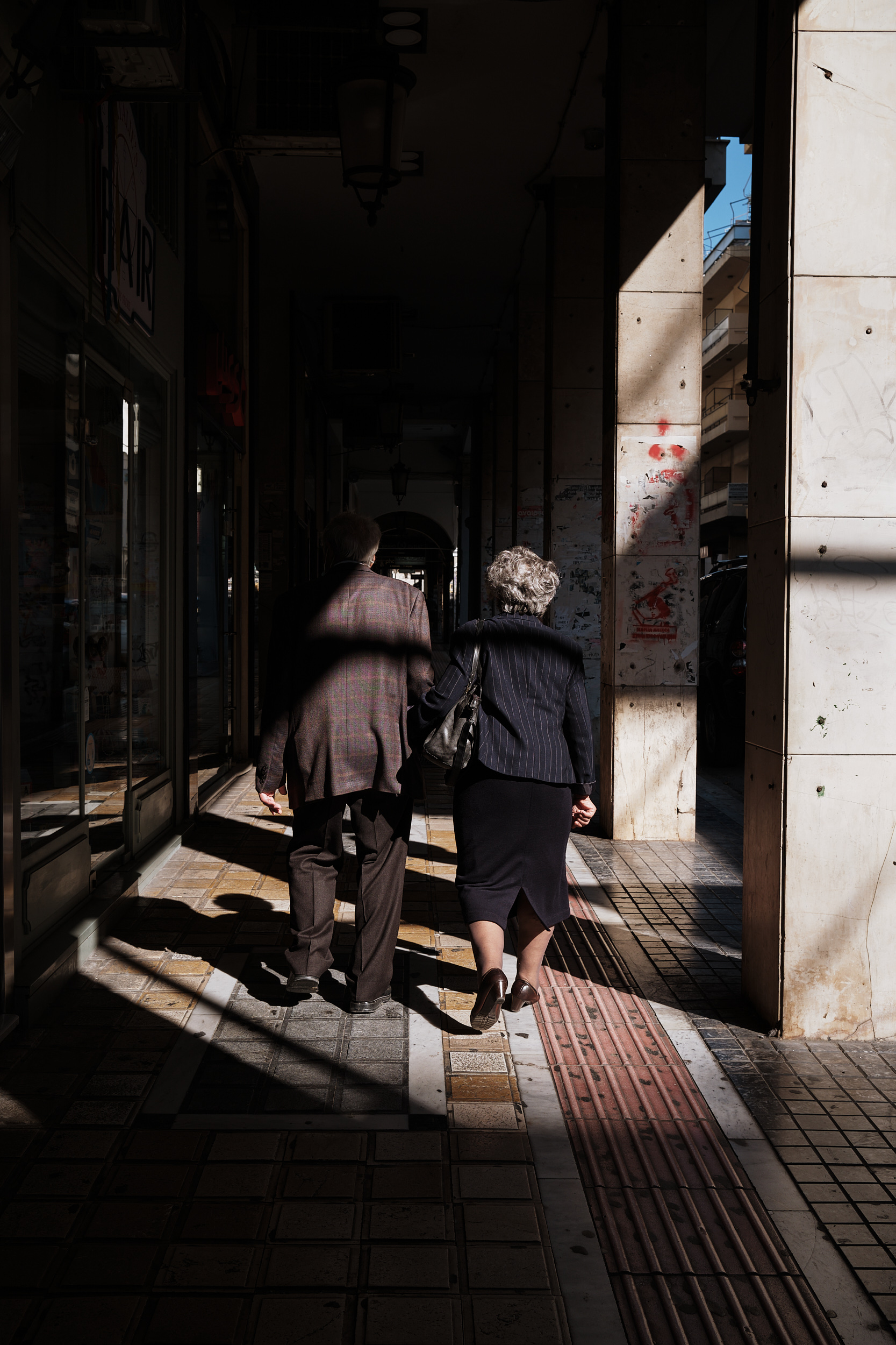 Light and shadows on Korinthou street, Patras, Greece. November 2021