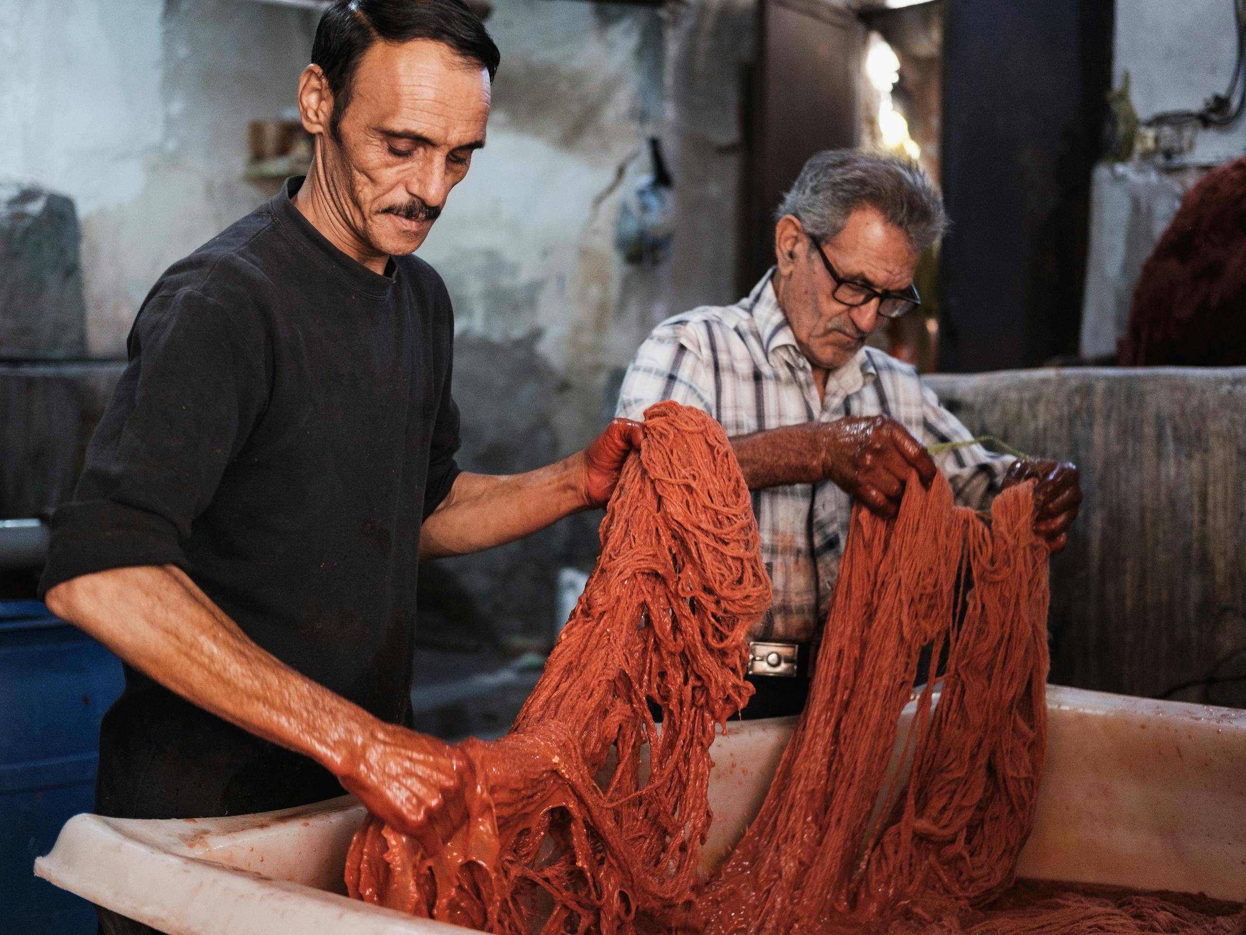 Wool dying process using natural earth pigments Kashan, Iran. November 2018 Photograph: Guido van Helten