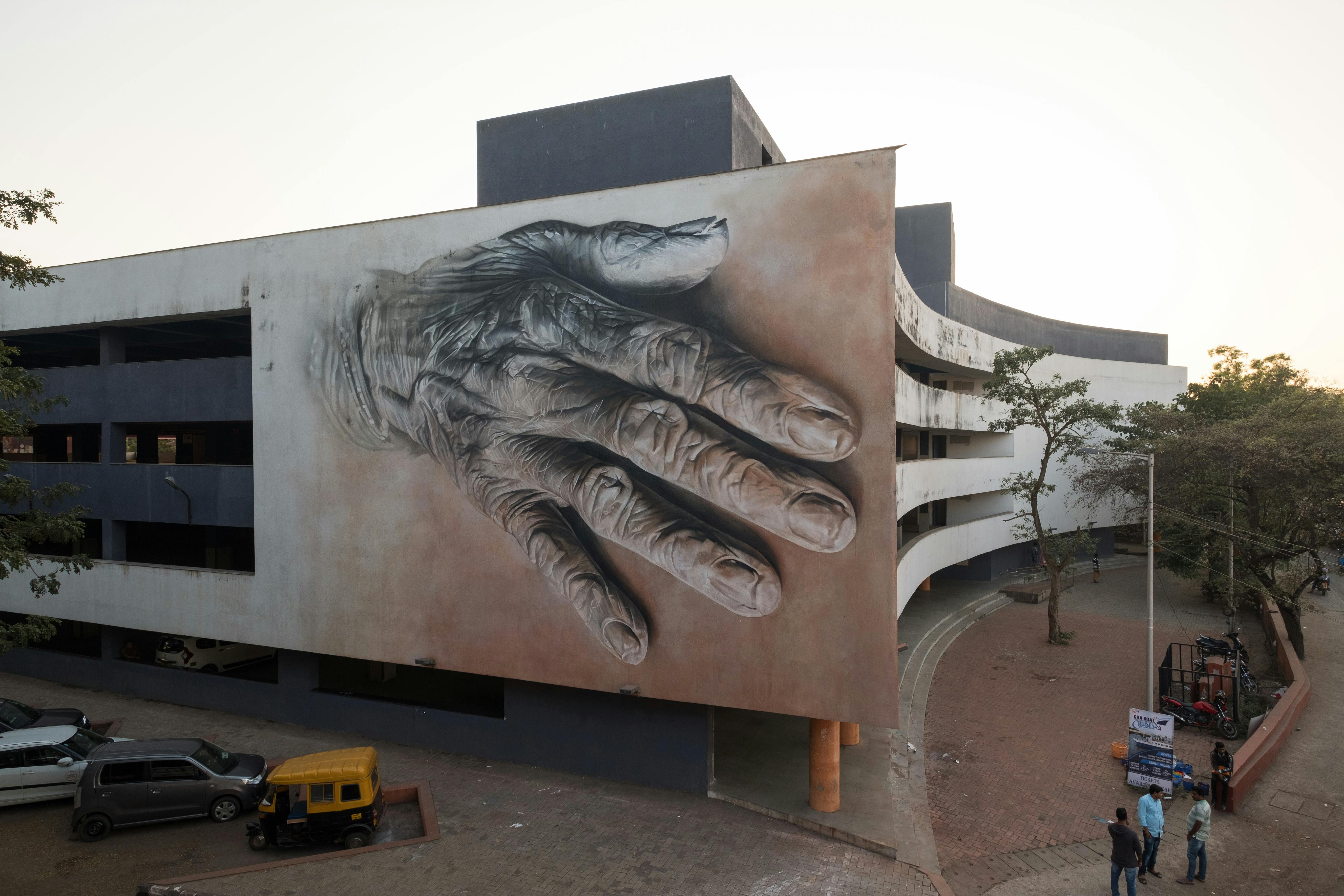 Terracotta Hand Study completed mural by Guido van Helten, Panjim City, Goa, India. December 2017 Photograph: Guido van Helten