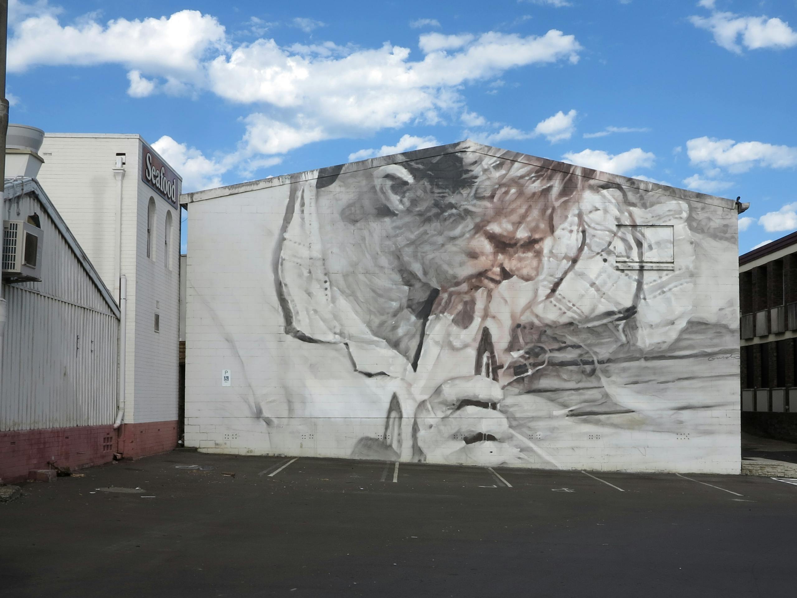 Fisherman at Greenwell Point Nowra, New South Wales, Australia. December 2014 Photograph: Guido van Helten