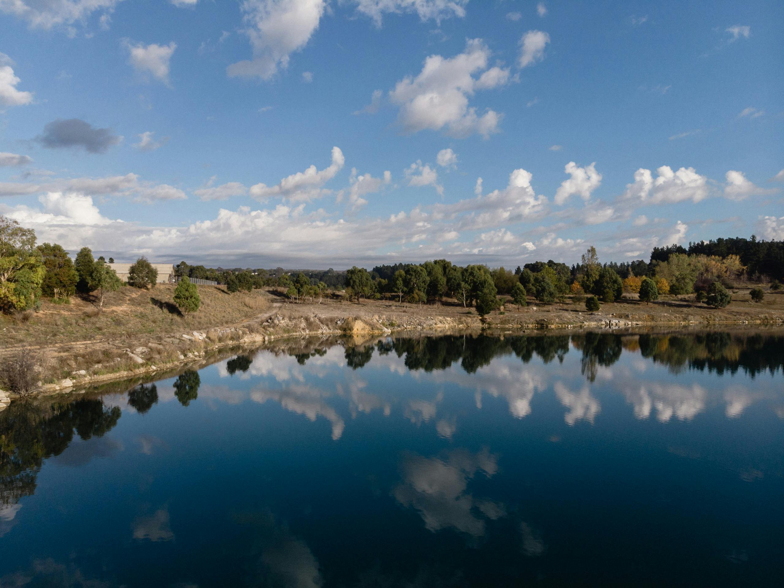 Lurid lakes have filled in the abandoned quarries on site Portland, NSW, Australia. May 2018 Photographs: Guido van Helten