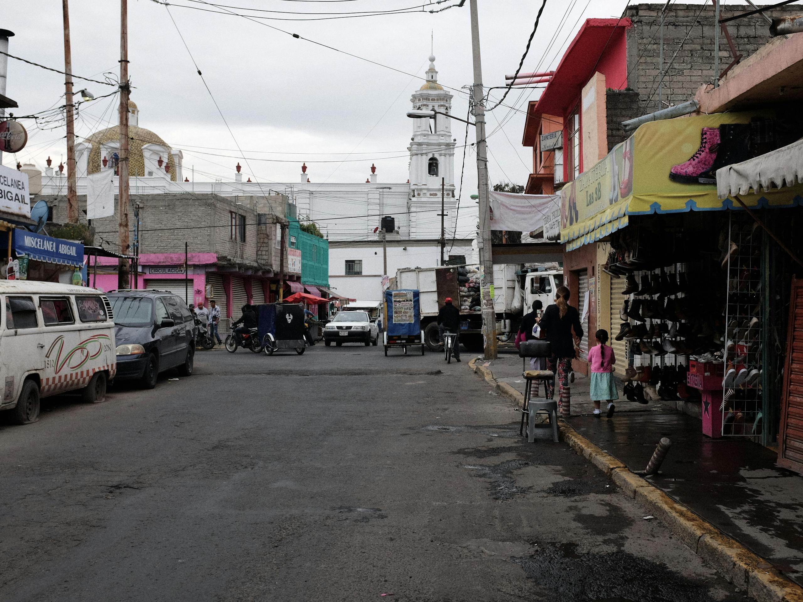 Streets in the centre of the city, Ecatepec, Estado de México, Mexico. July 2016 Photograph: Guido van Helten
